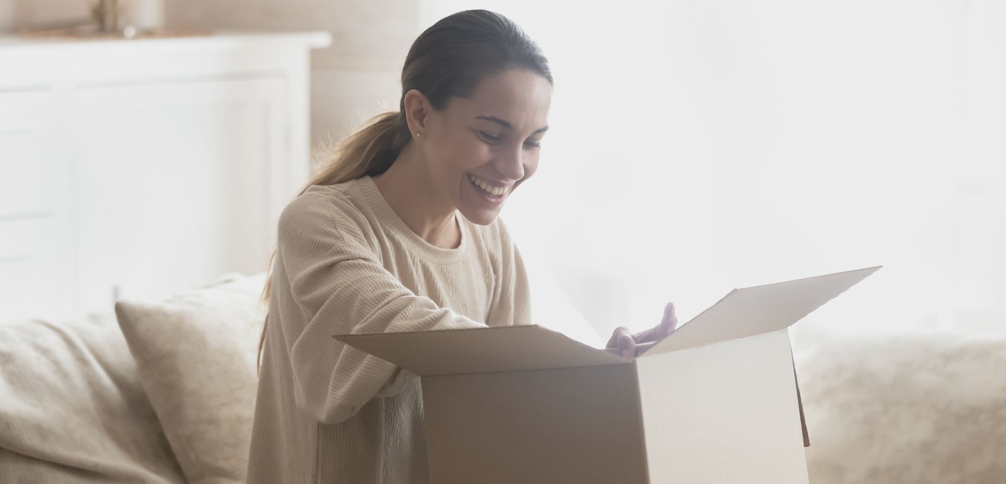 woman opening nurse care package