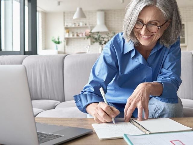 woman working remotely and joining a zoom meeting