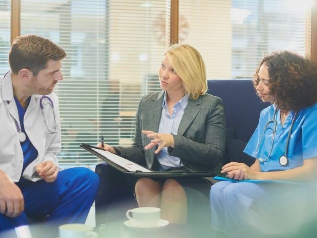 chief nursing officer with nursing staff