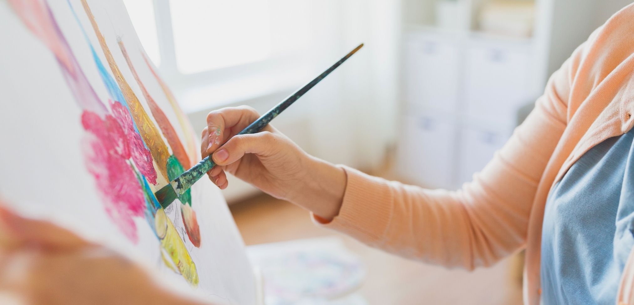 woman practicing therapeutic art