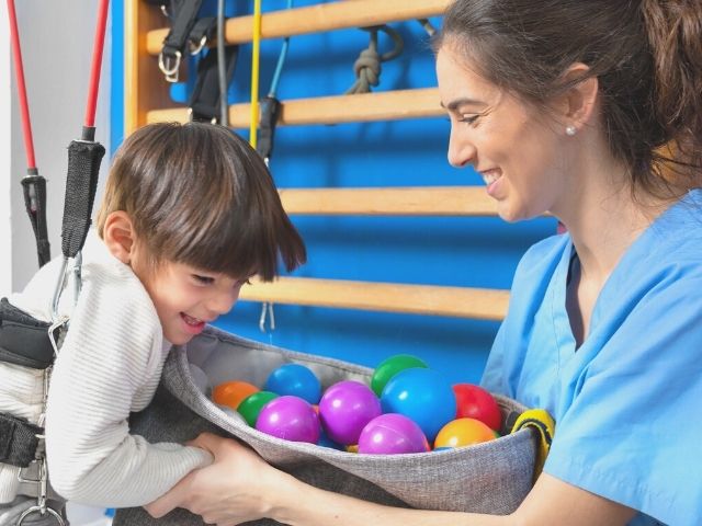 nurse working with patient with disability