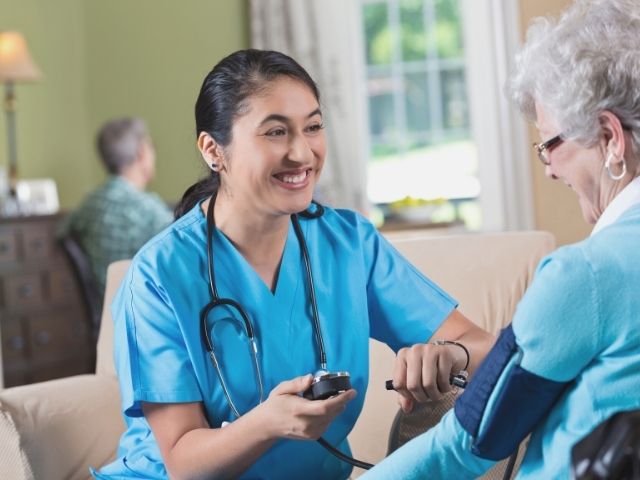 nurse with geriatric patient