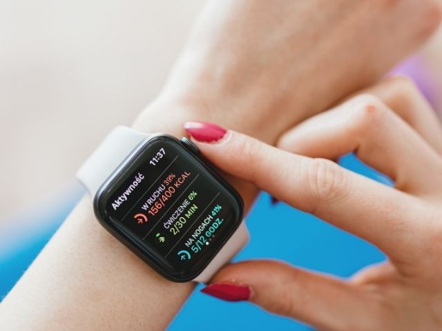 nurse checking smart watch